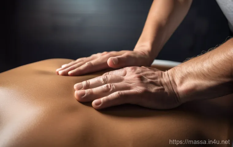 스포츠마사지사의 전문용어 정리 - A detailed, close-up shot of a professional sports massage therapist's hands applying focused, deep ...